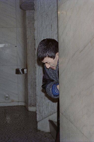 Aquiline nose person coming out of a building, Tokyo