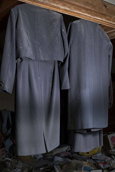 Clothes hanging in abandoned house, Namie, Fukushima