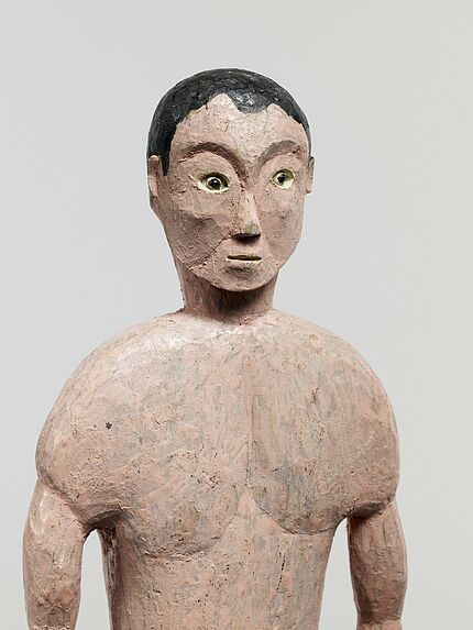 Statuette représentant un homme Yami