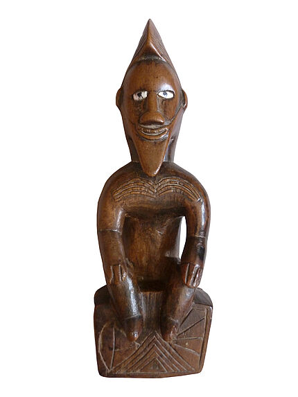 Statuette masculine assise