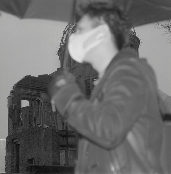 Person with mask crossing the Abomb building, Hiroshima